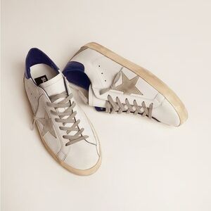 Golden Goose men’s Super-Star sneaker w/ suede star and blue heel - US 7 (40)
